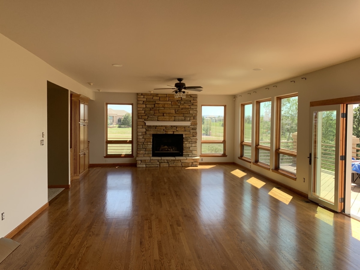 The beige-painted walls in the living room are smooth and well-finished, showcasing the high-quality work by Elk Horn Painting.