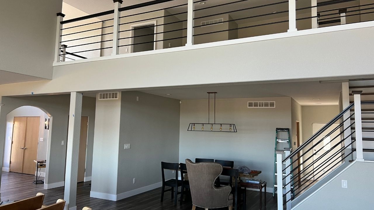 A living room with newly painted fresh off-white finish by Elk Horn Painting.