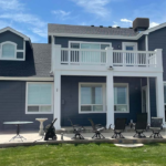 An image of Krysti McMillan’s newly painted home stands fresh and modern, showcasing a flawless finish that enhances curb appeal and provides lasting protection against the elements.