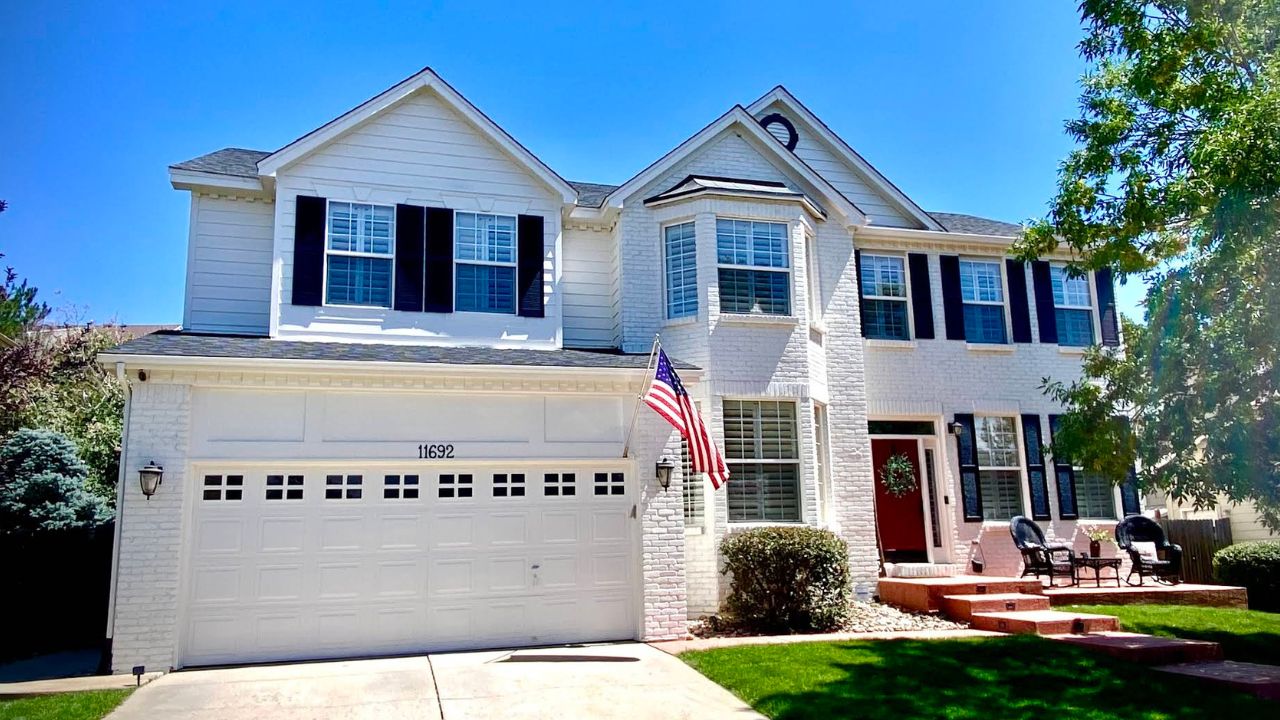 Newly painted brick home in Castle Rock, CO with a crisp white, clean finish.