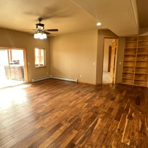 Interior Painters - Elk Horn Painting - Denver A newly painted interior of a house using a cream and yellowish paint.
